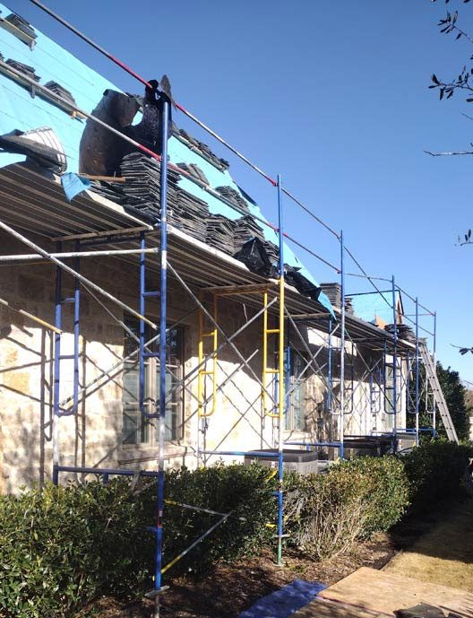 Roofer fall-protection scaffolding 25