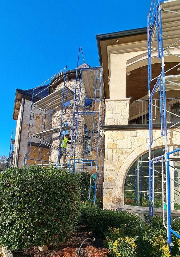 Roofer fall-protection scaffolding 26