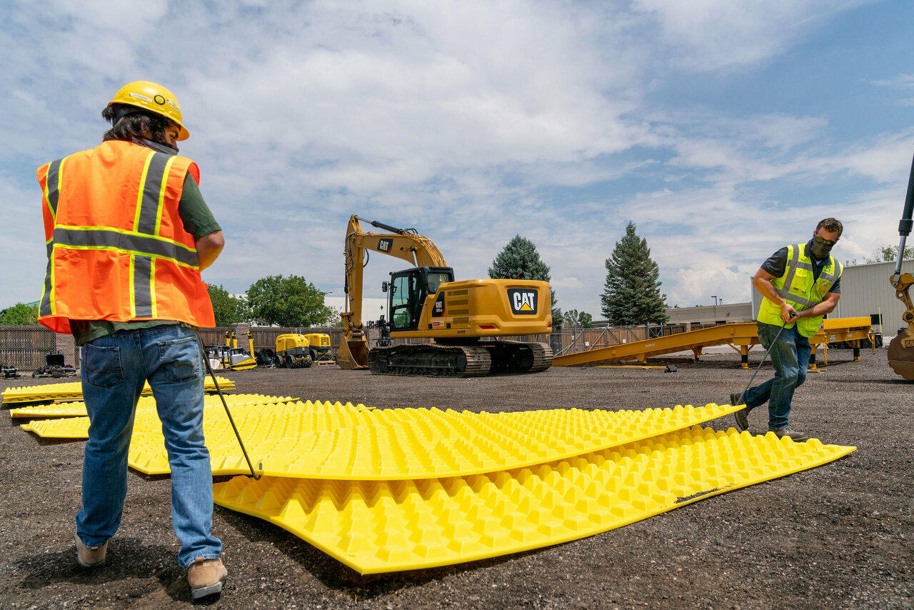 Trackout control mats on a job site 13
